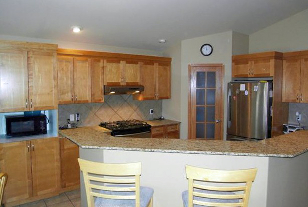 Beautiful kitchen! Click Image for more information or Call (204) 792-6453.